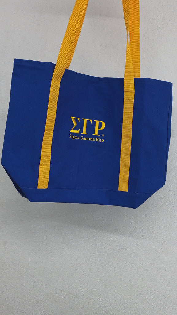 Royal blue and golden sorority handbag with embroidered Greek letters
